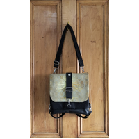 Water repellent upholstery canvas satchel with leather base